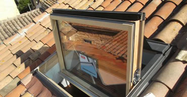 Pose et réparation de fenêtre de toit à Brin